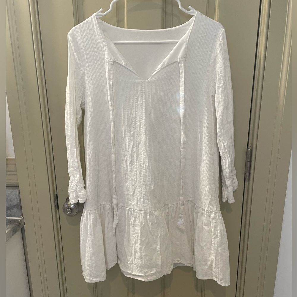 White long sleeve baby doll style dress